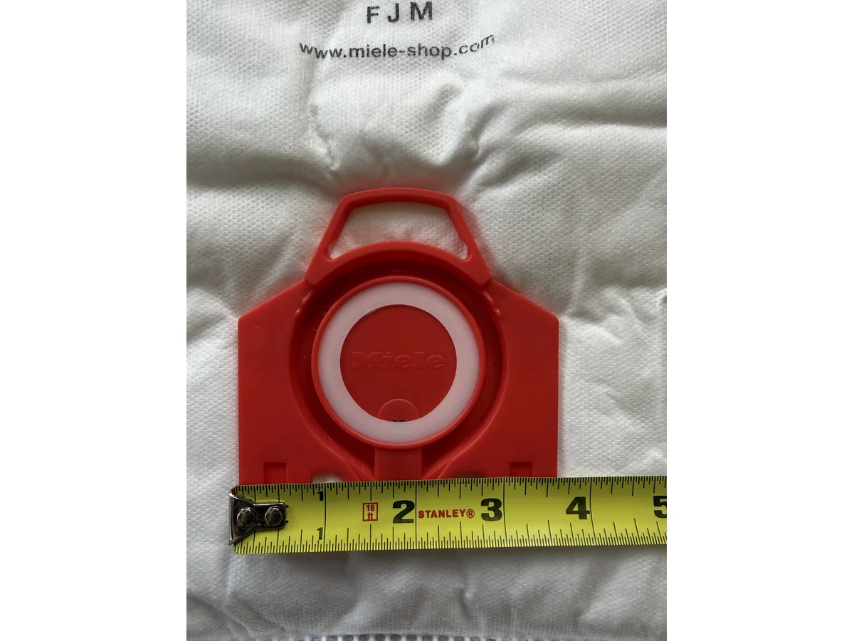 Miele FJM red collar width measured with tape for FJM replacement bag sizing