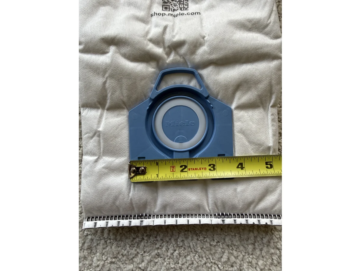 Close up of Miele GN blue collar opening measured with tape
