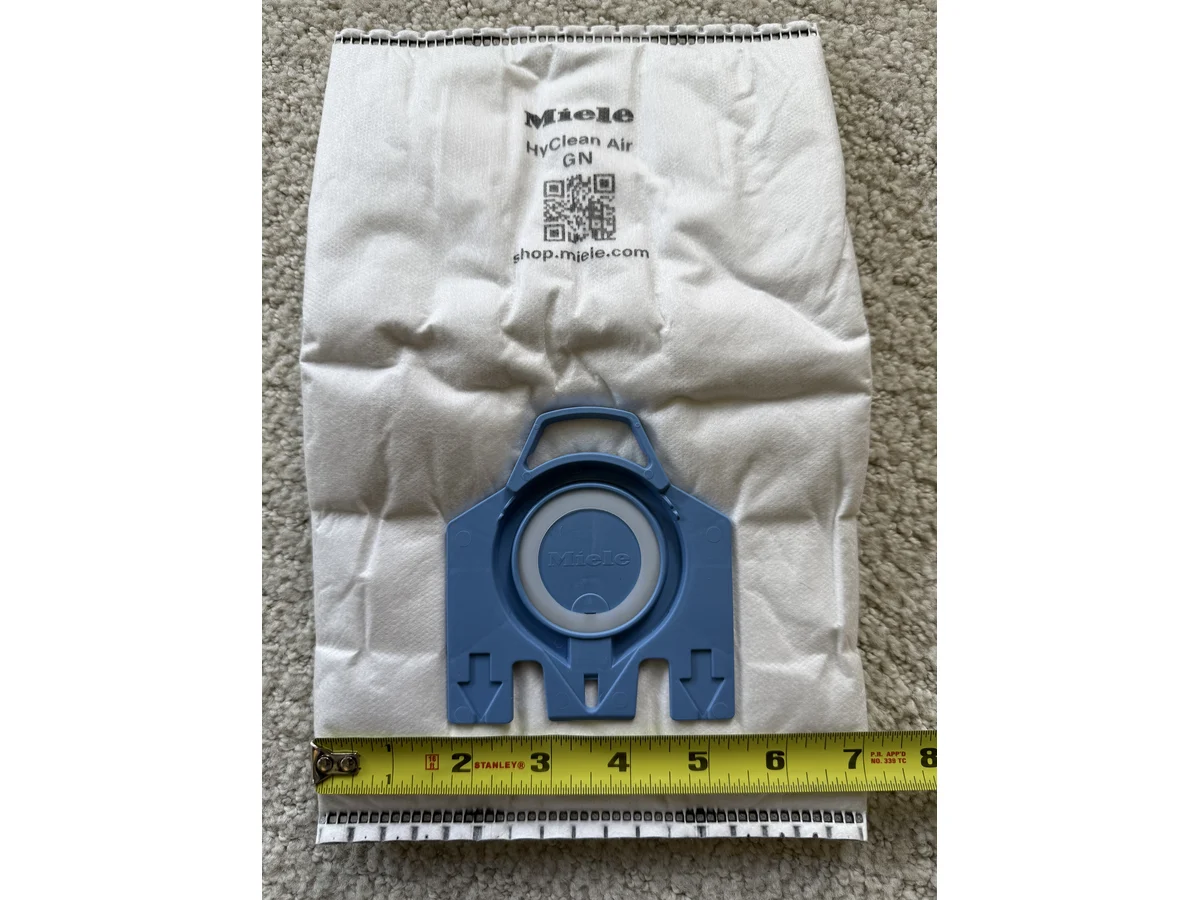 Miele GN blue collar width measured with tape for replacement bag sizing