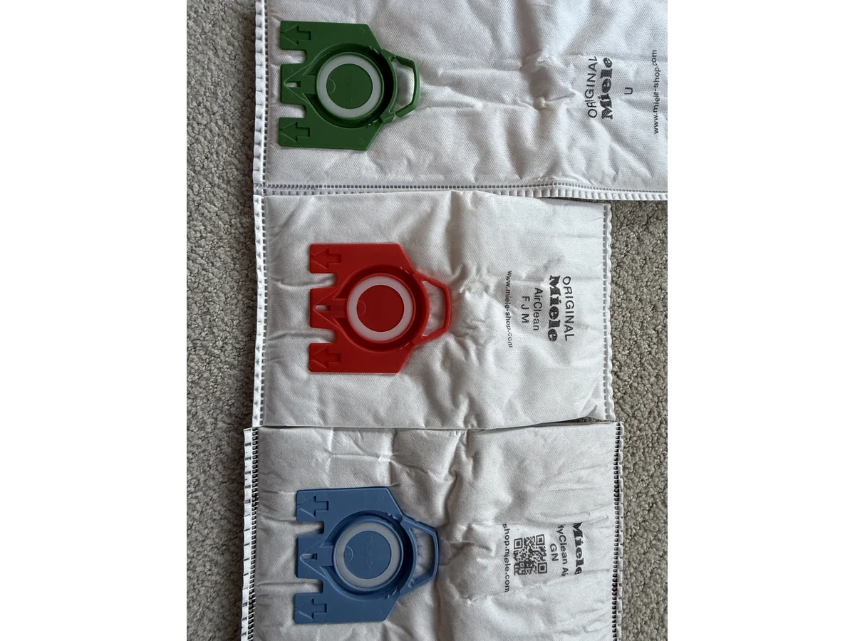 Miele GN blue collar compared with Miele FJM red collar and Miele Type U green collar