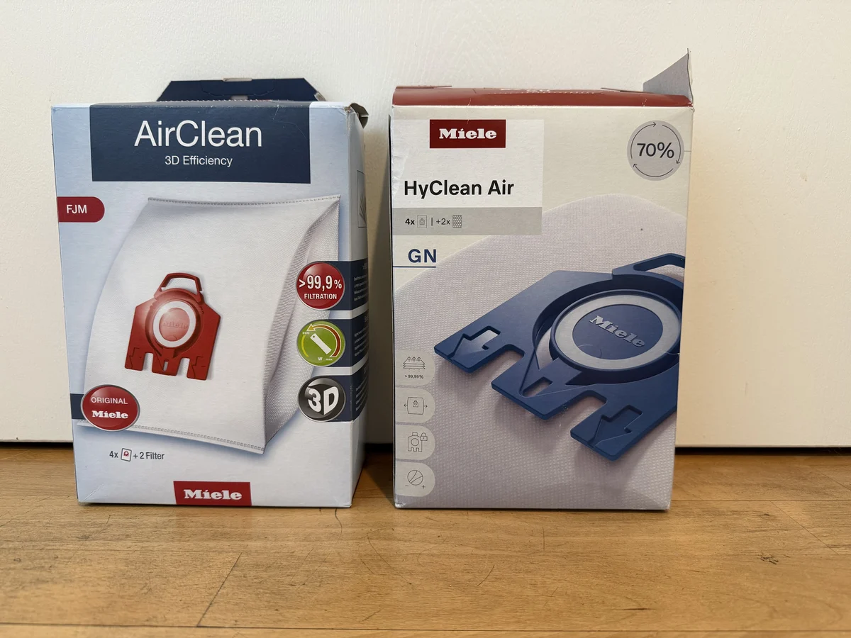 Miele FJM and Miele GN vacuum bag package fronts side by side