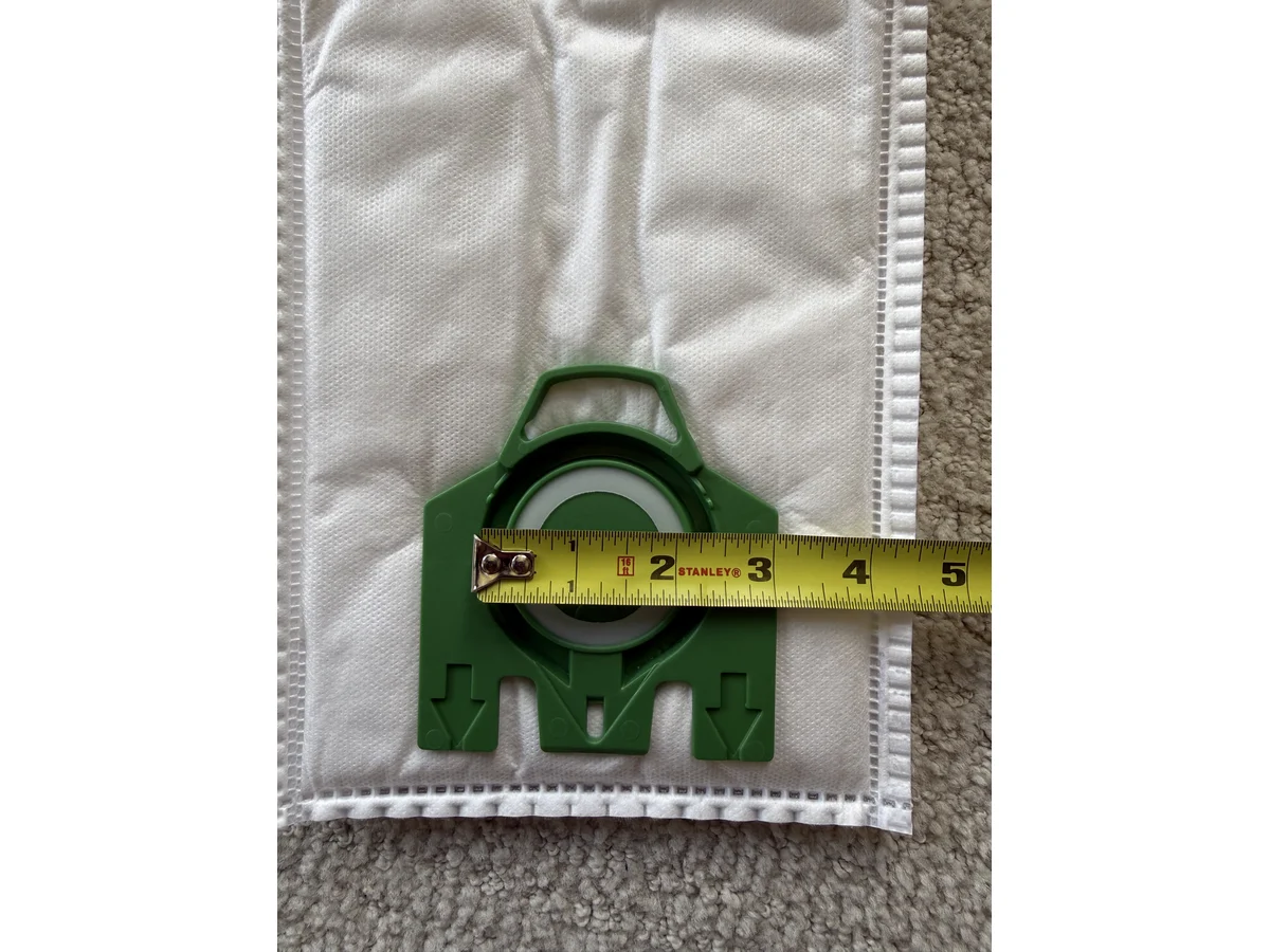 Miele Type U green collar opening measured with tape for upright bag sizing